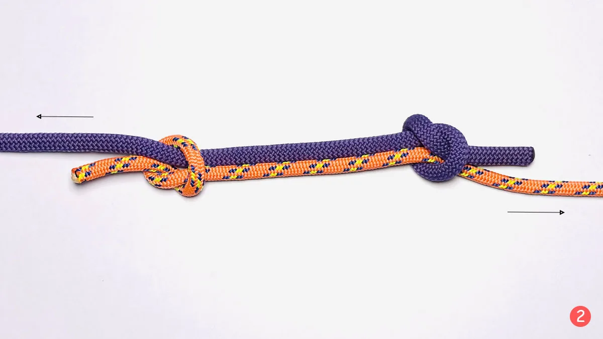 fisherman's-knot-step-2-how-to-tie-a-fisherman's-knot-knotspedia