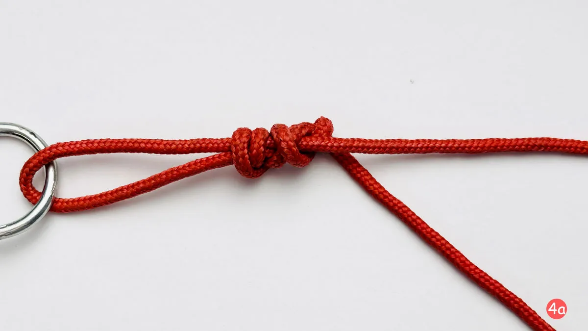 uni-knot-step-4a-how-to-tie-a-uni-knot-knotspedia