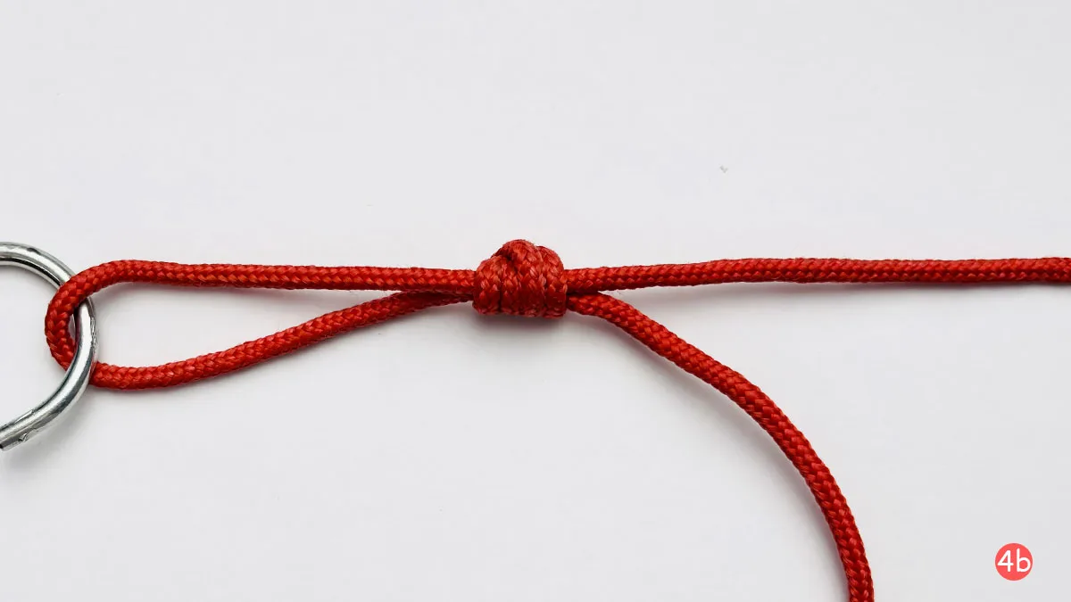 uni-knot-step-4b-how-to-tie-a-uni-knot-knotspedia