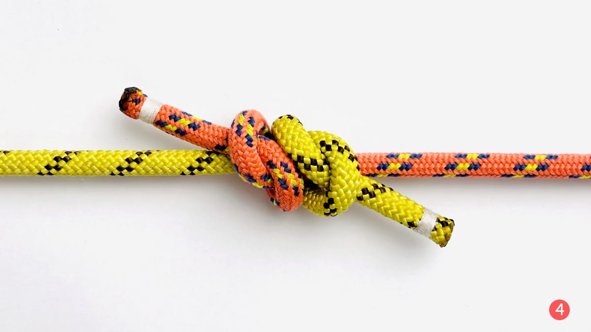 fisherman's-knot-step-4-how-to-tie-the-fisherman's-knot-knotspedia