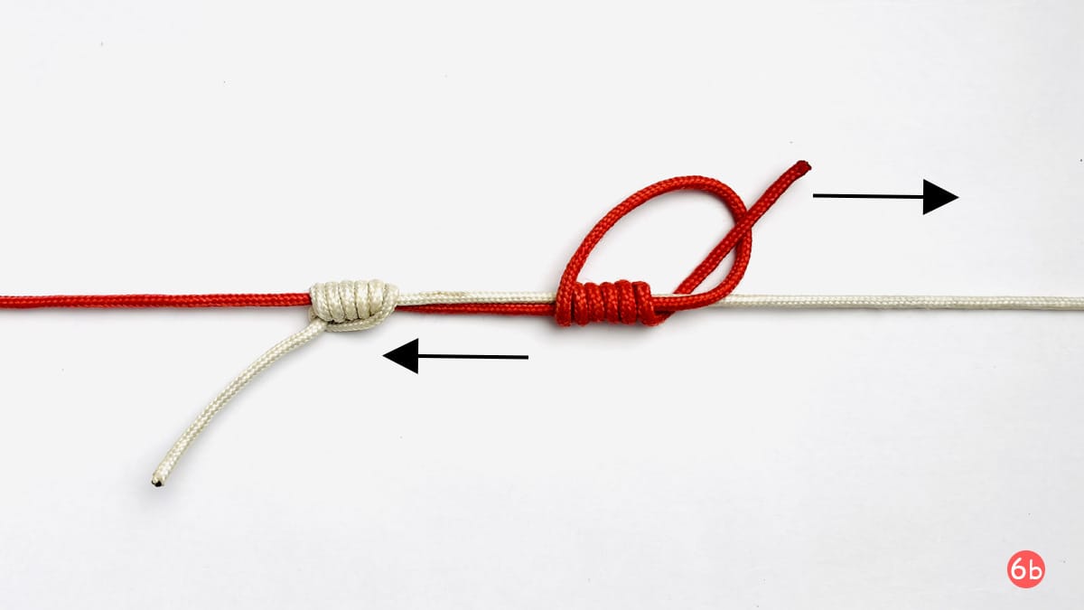 double-uni-knot-step-6b-how-to-tie-the-double-uni-knot-knotspedia double-uni-knot-step-6b-how-to-tie-the-double-uni-knot-knotspedia